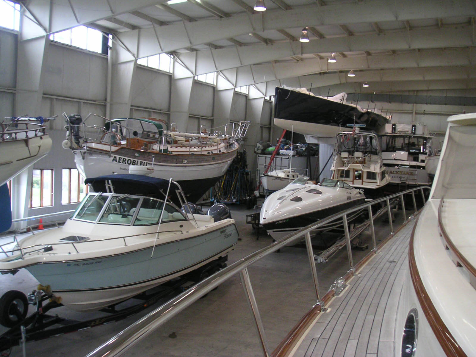 Boats stored inside a heated storage building