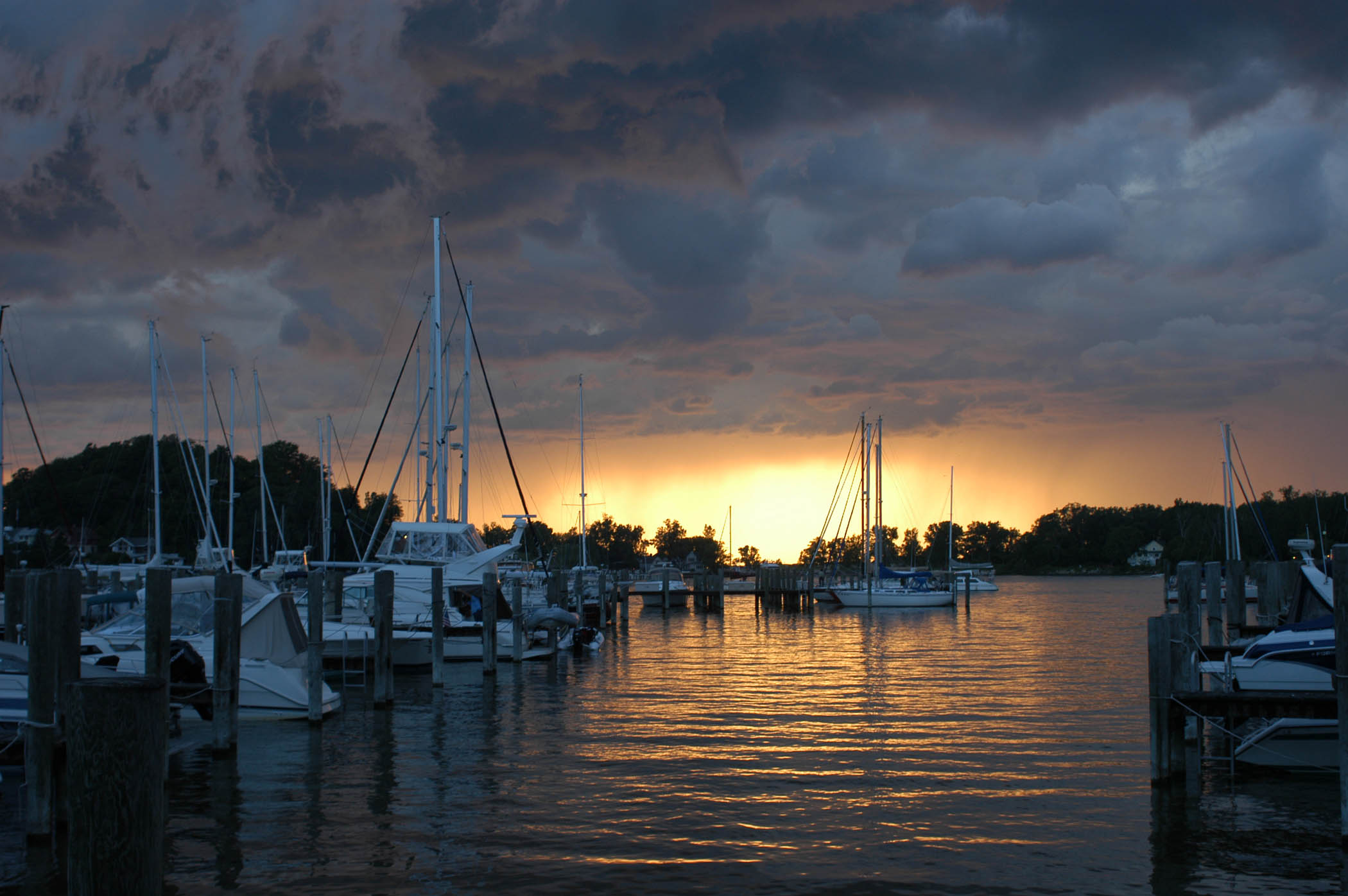 Storm clouds and sunset over the docks at Eldean Shipyard