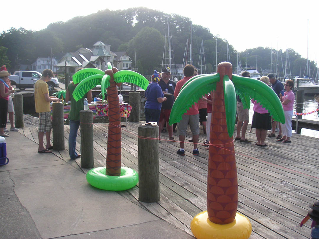 Boaters gathered on the dock for a marina party at Eldean Shipyard