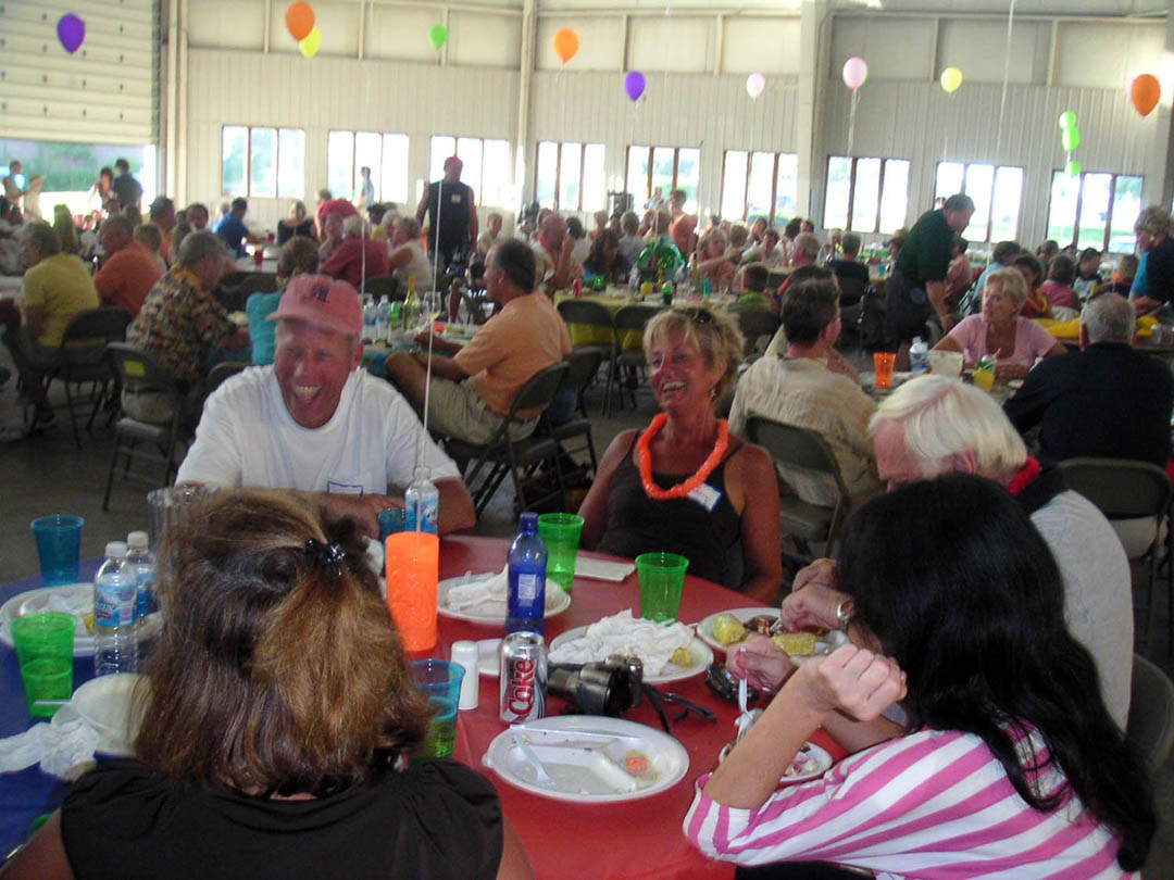 Guests filling the party barn during an event