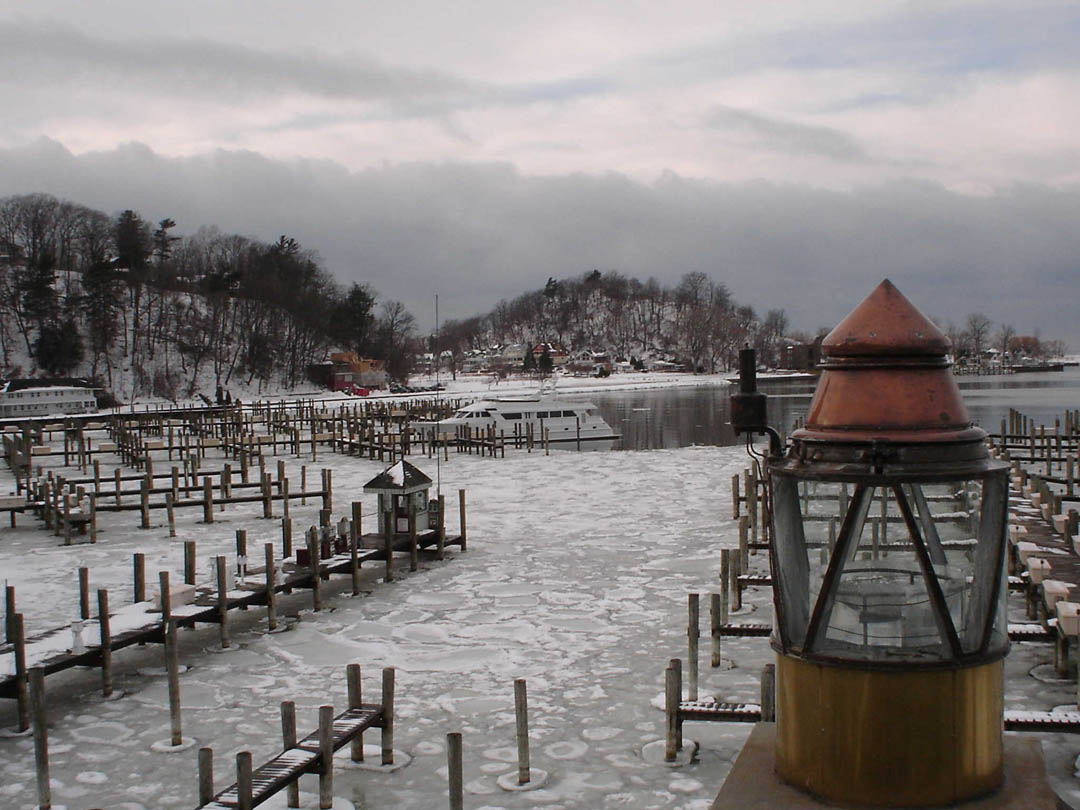 Snow covered docks on Lake Macatawa in winter